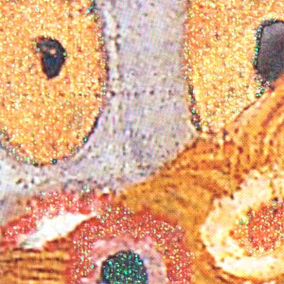 Gold flecks throughout the collage