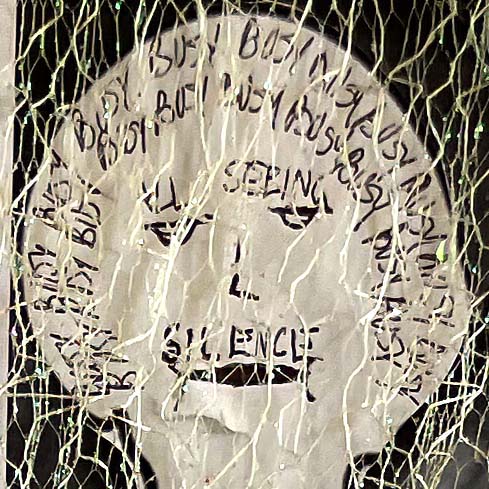 'Busy' written repeatedly around the head