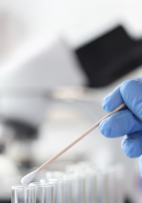 taking test samples from test tubes