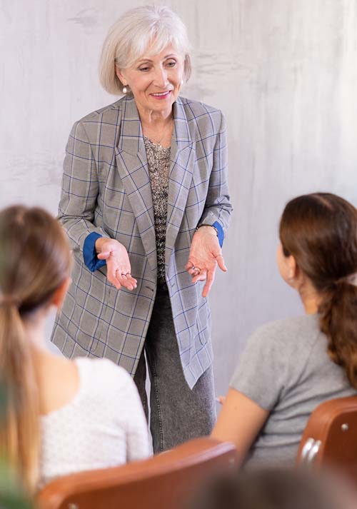 A survivor advocate talking to a group of people